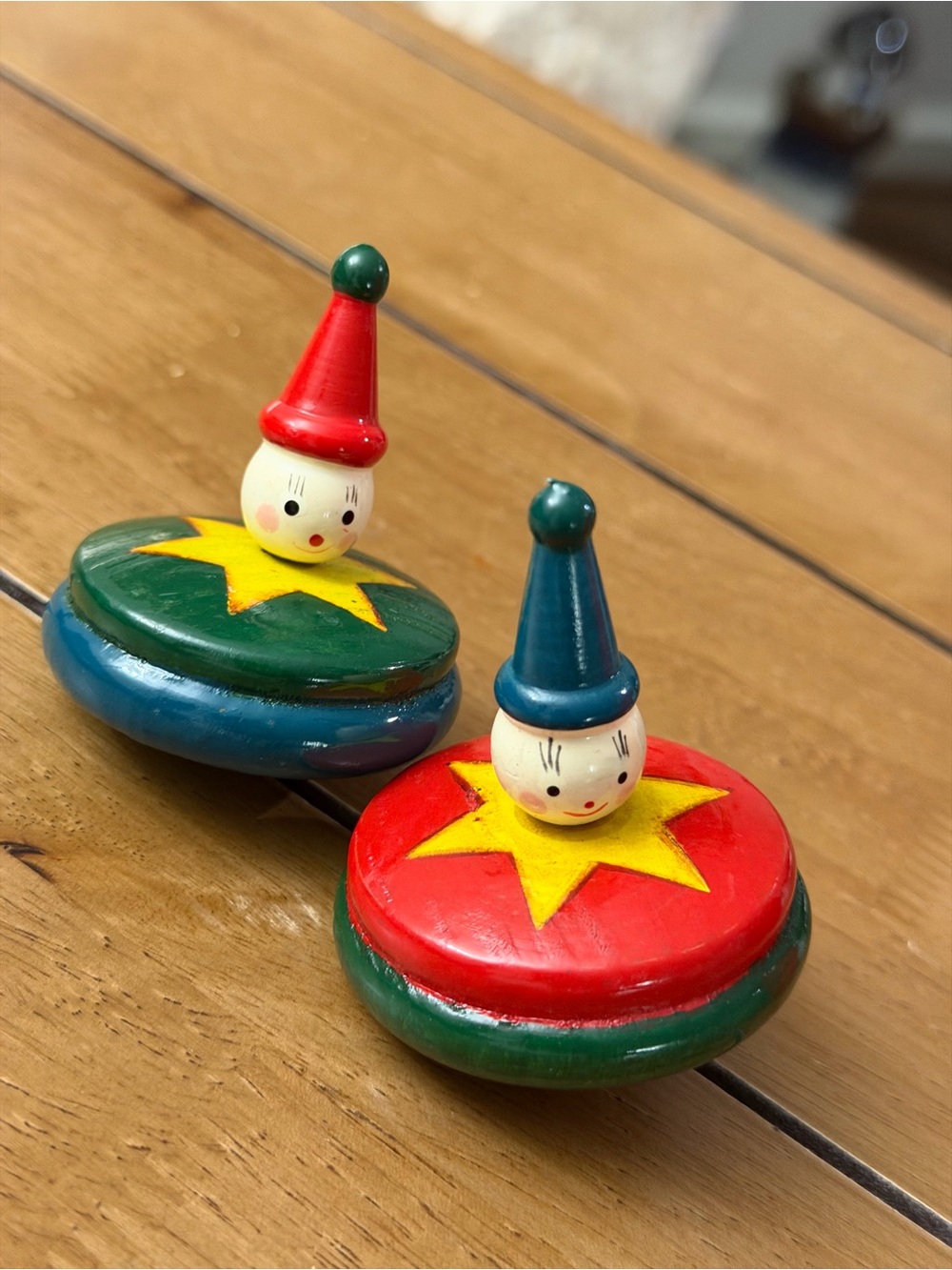 Set of 2 Vintage Wooden Clown Hand- Spin Tops - Red & Green